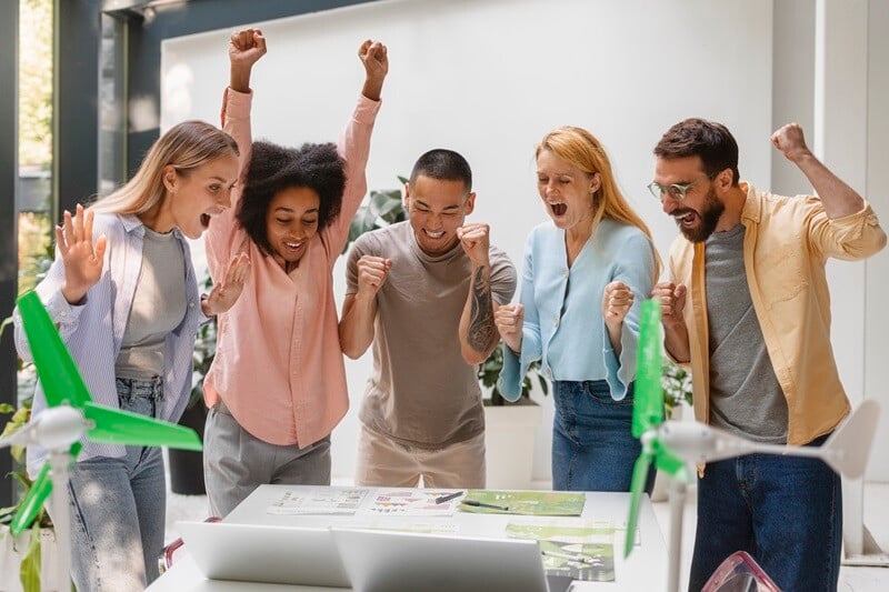people-working-tech-brand-together